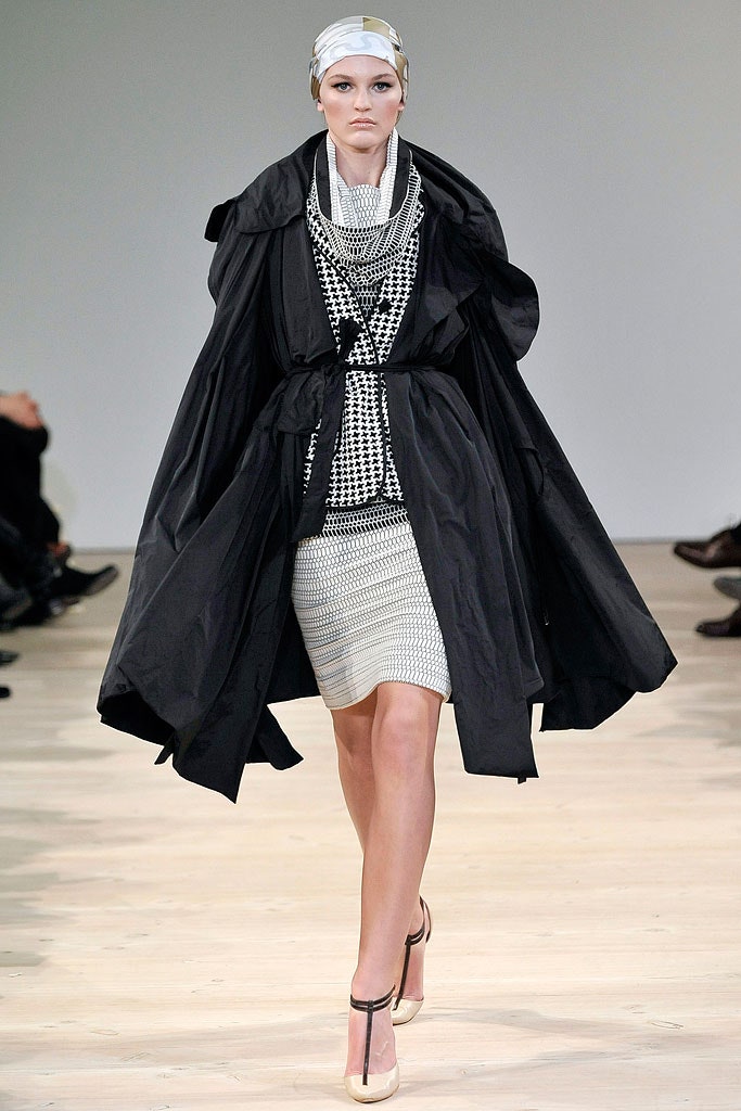 black coat over white dress