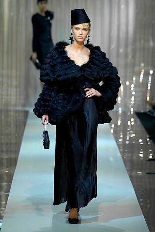 black fur coat and silk dress