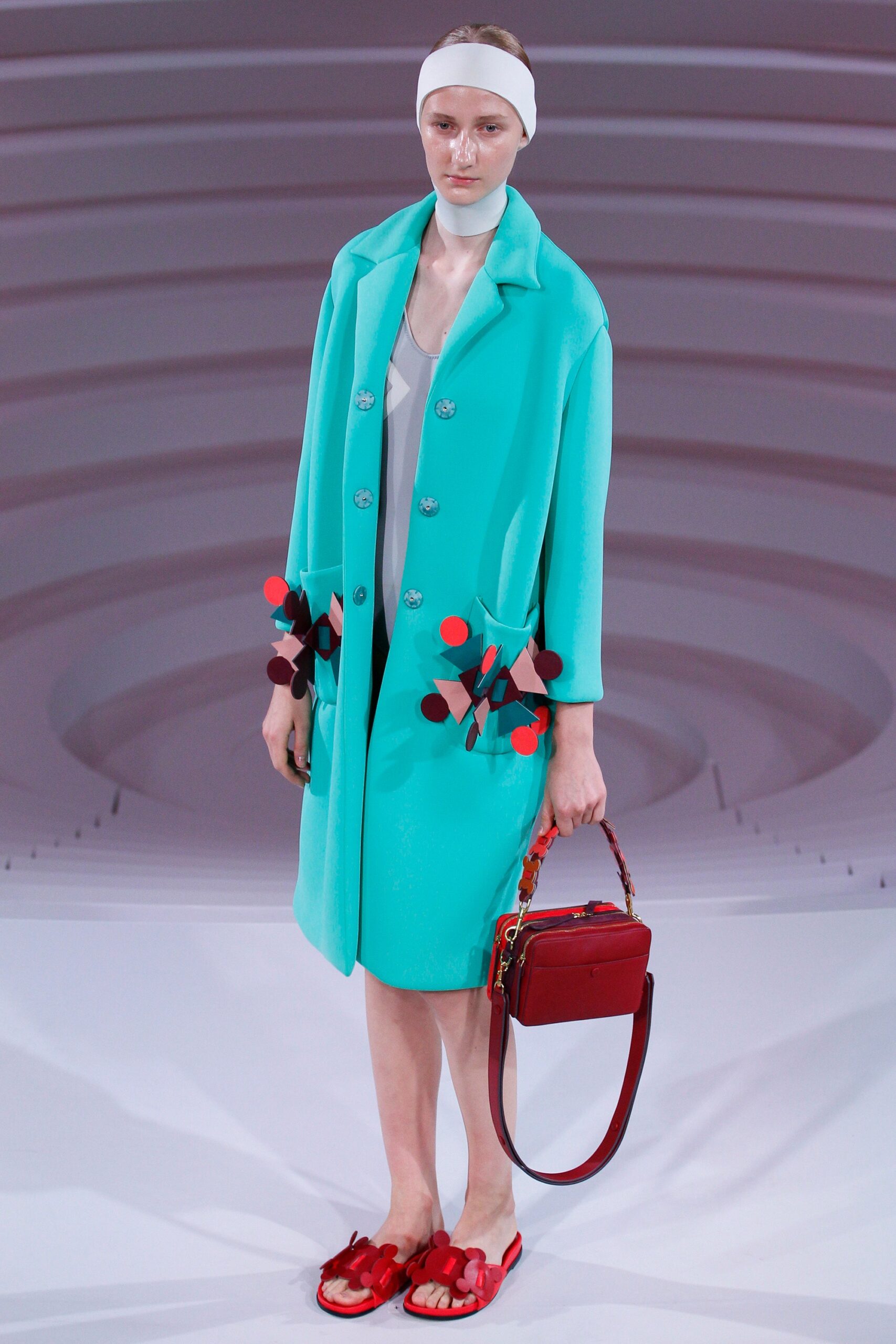teal coat with white dress