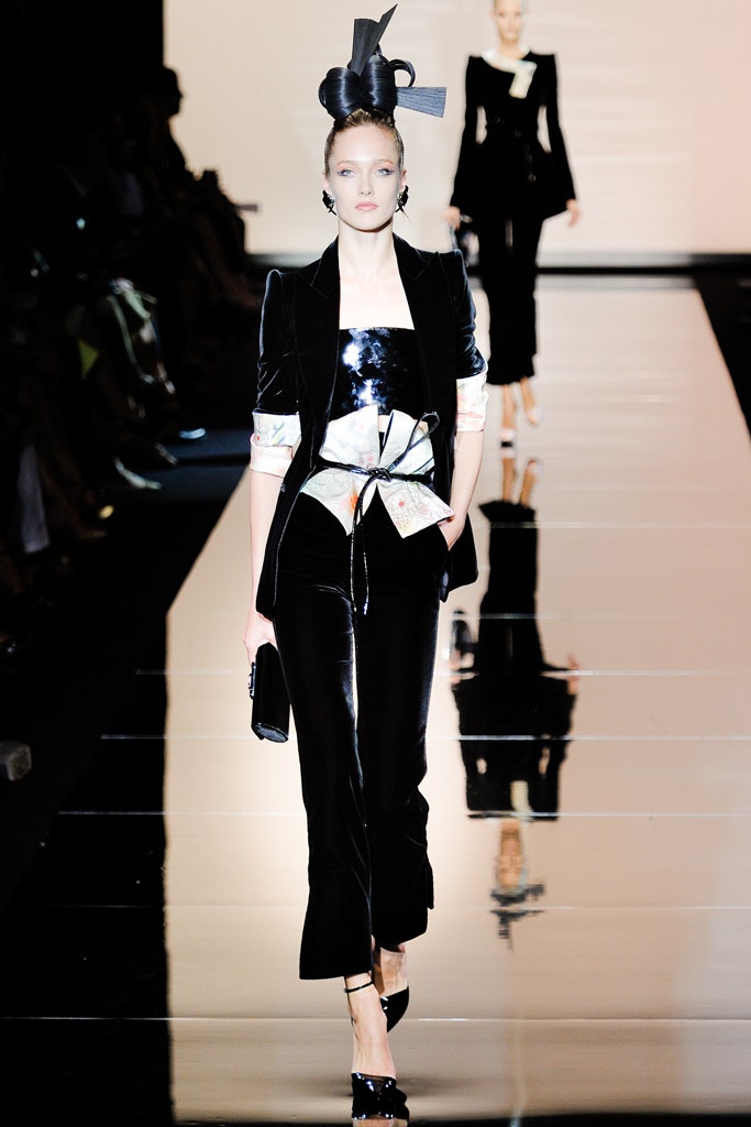 black and white fitted top with tailored pants