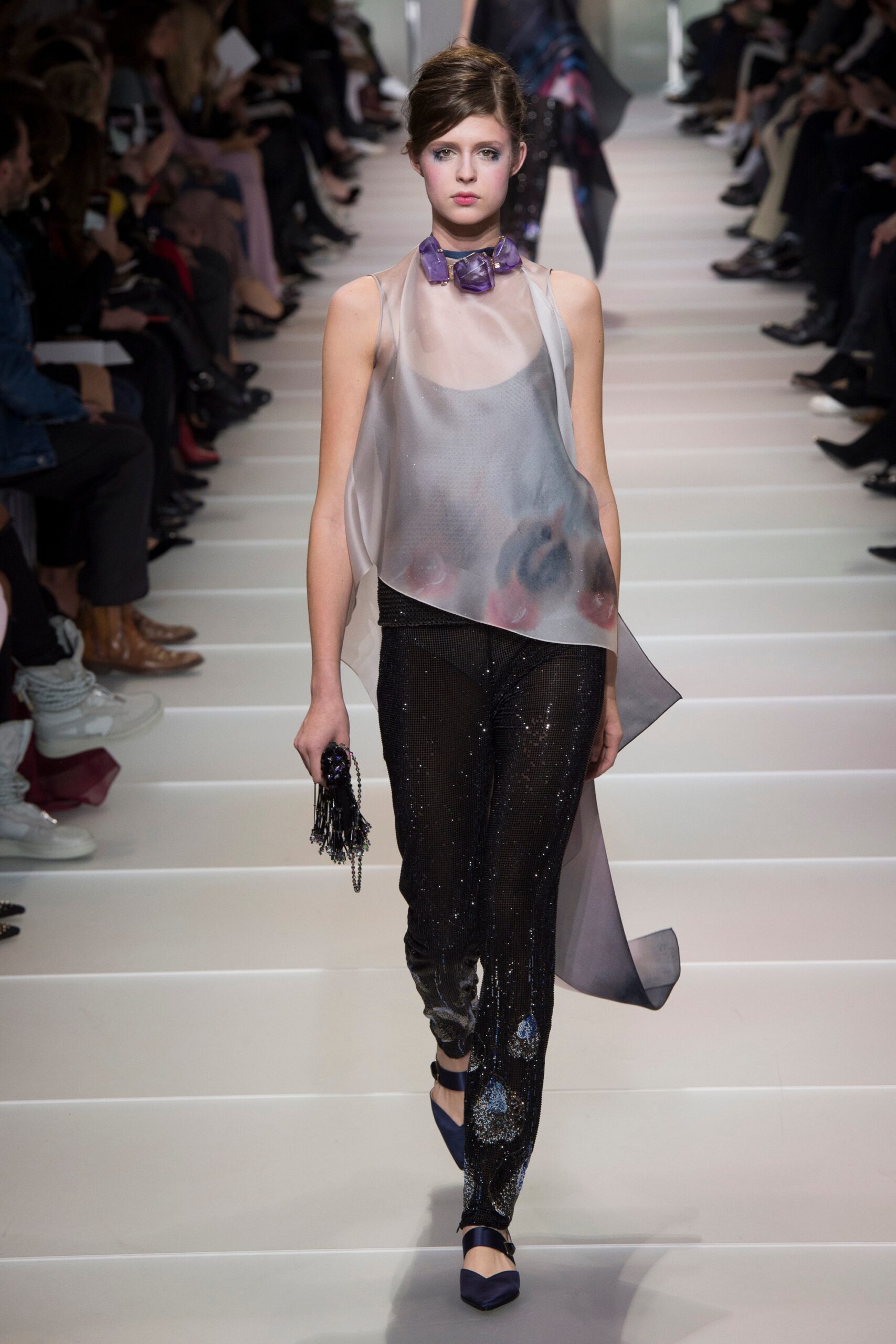 sheer white top and black sequined pants