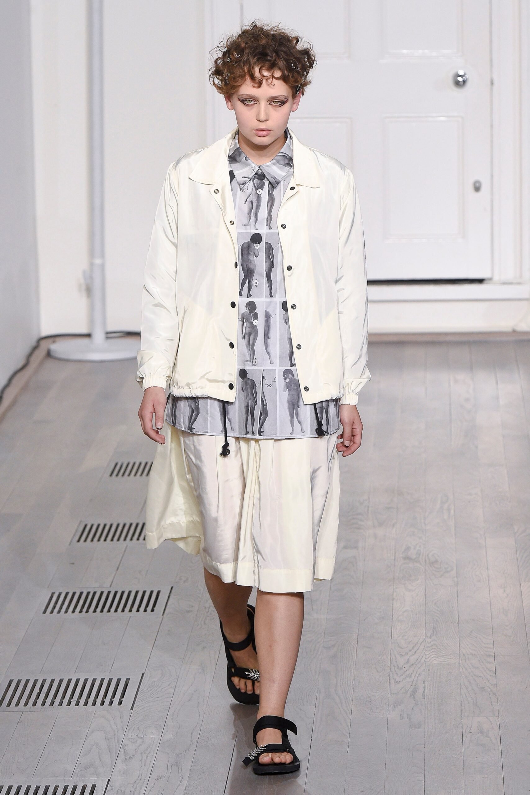 white relaxed jacket gray shirt pleated skirt