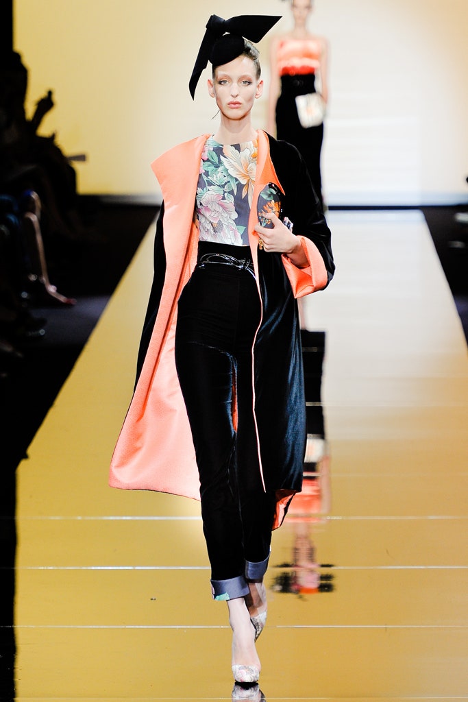 black and orange draped coat