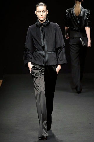 black silk fitted jacket and tailored pants