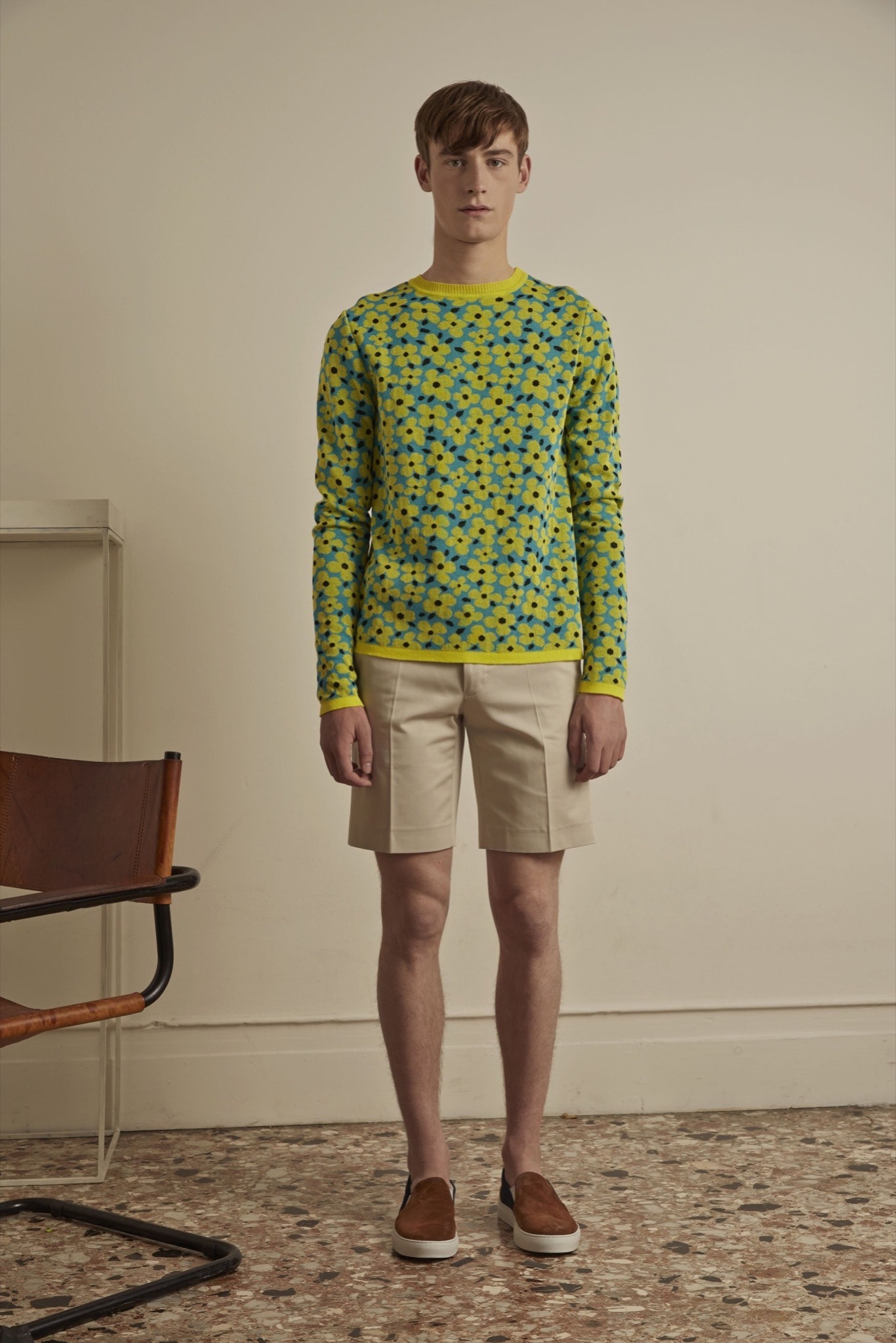 yellow printed long-sleeve top with beige shorts