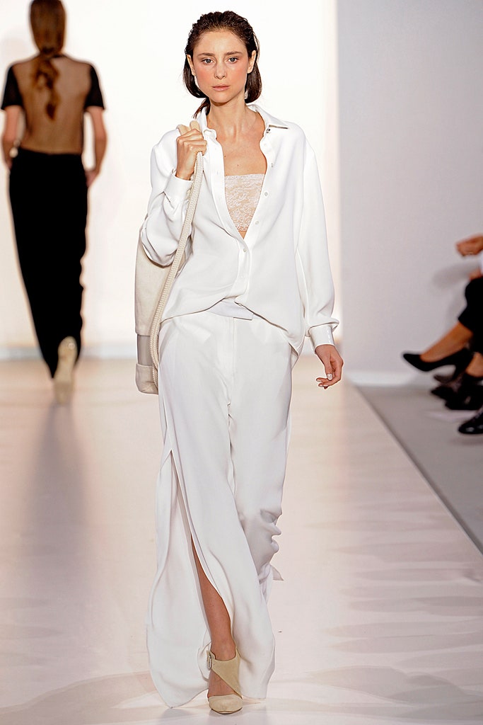 white silk slit fitted high-waisted pants