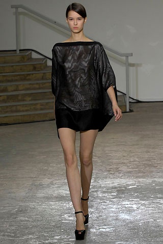 black sheer top and mini skirt