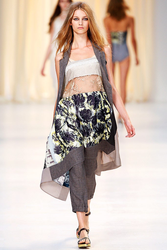gray silk sleeveless top with layered cape