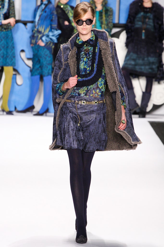 gray fur coat with printed blouse