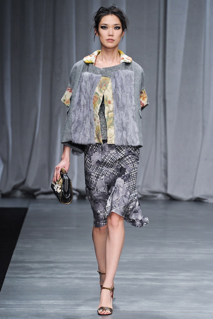 gray faux-fur jacket and floral dress