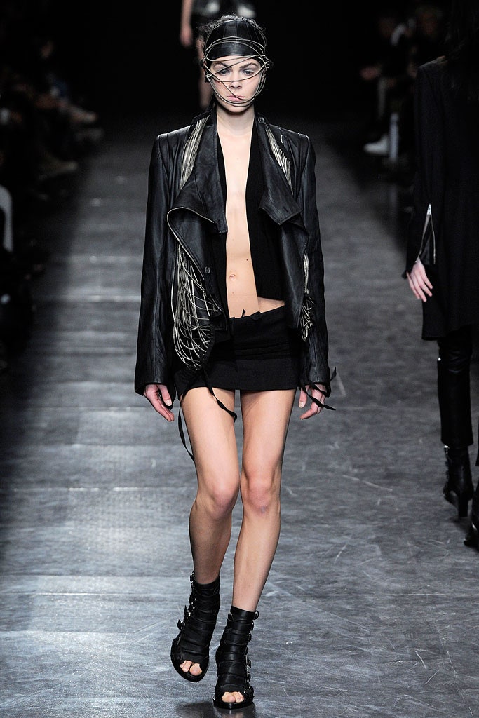 black leather fitted jacket and mini skirt