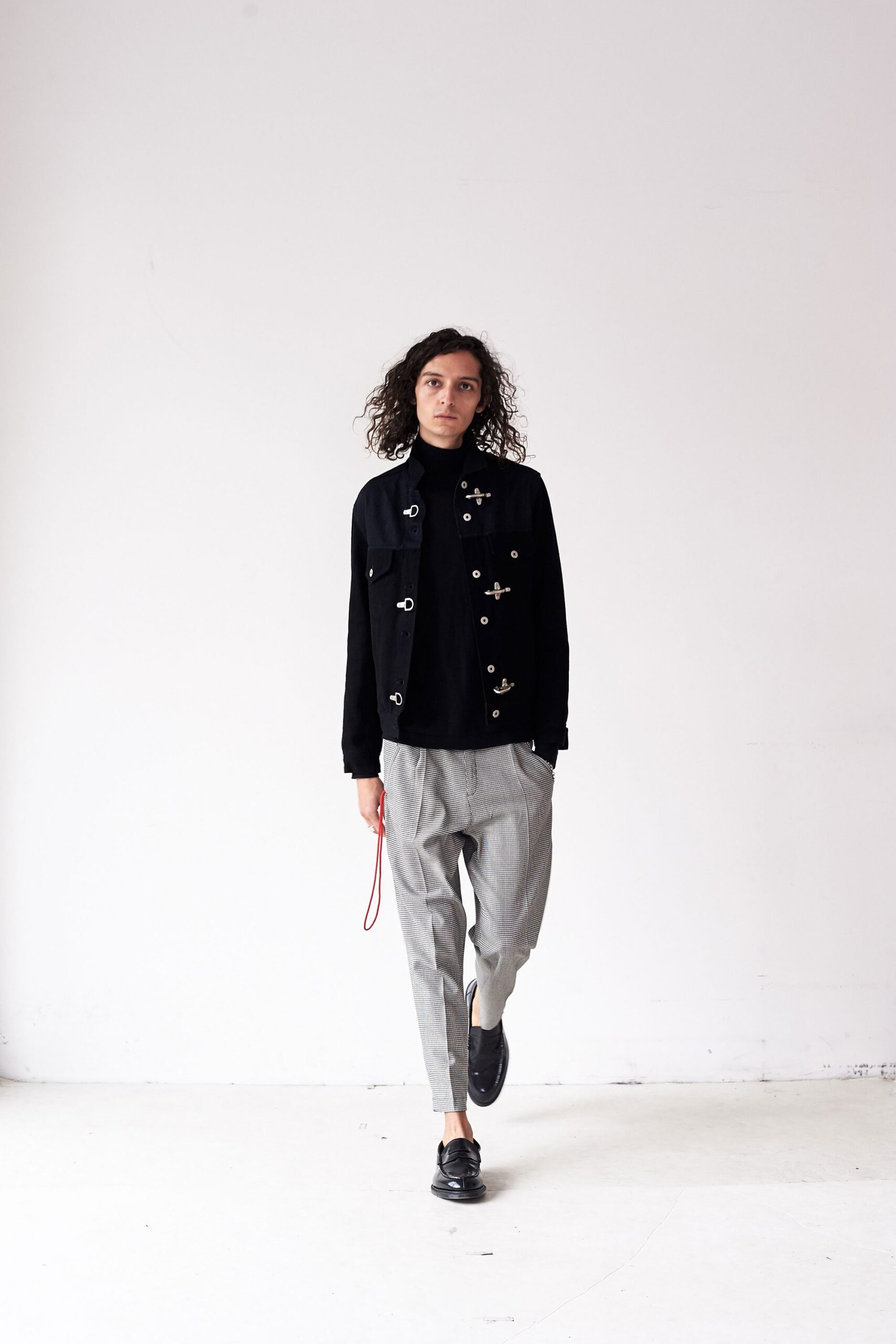 black relaxed jacket with gray pants