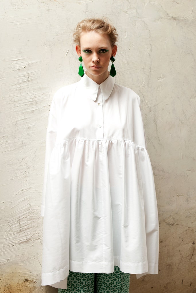 oversized white shirt with printed green pants