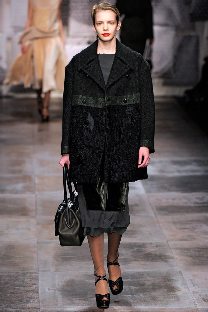 black wool coat and silk dress