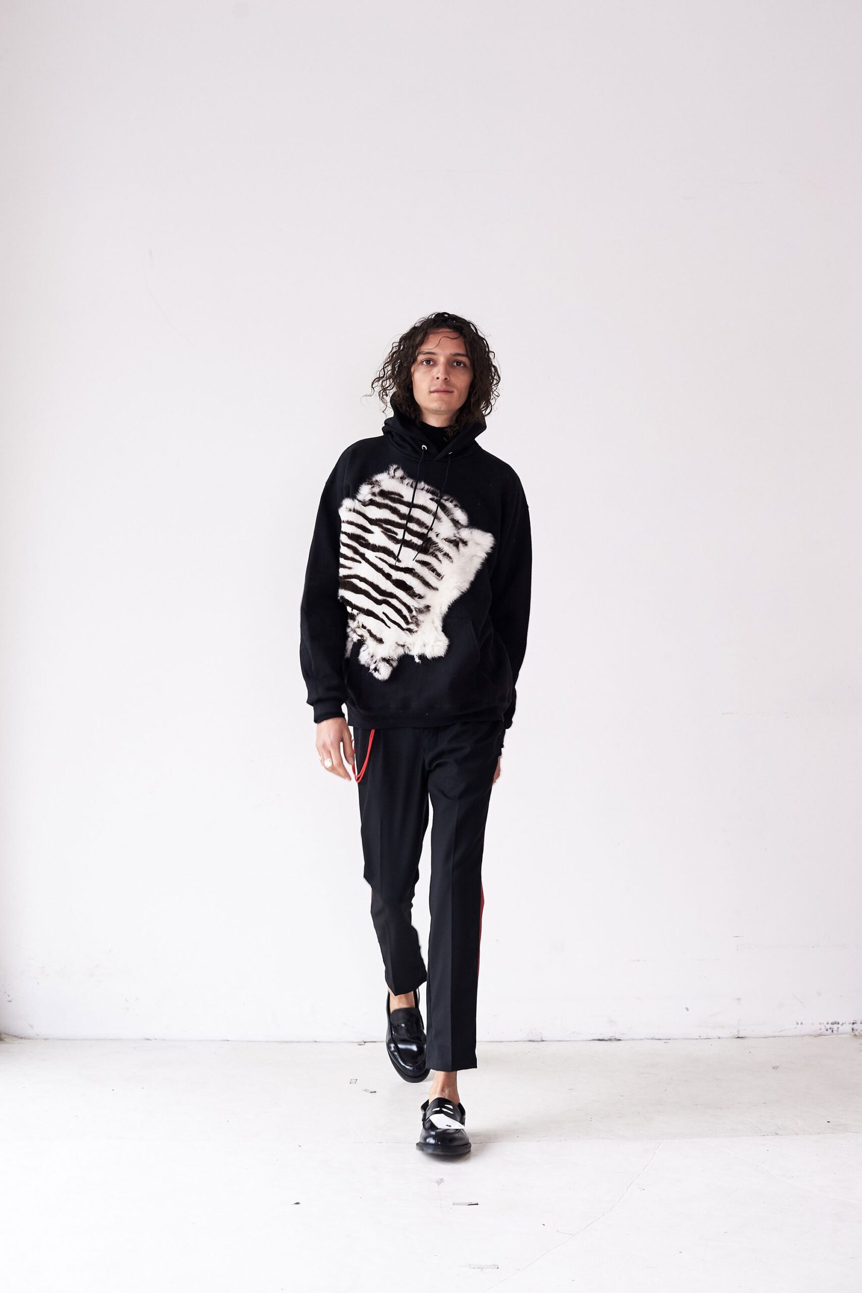 black and white printed hoodie with slim pants