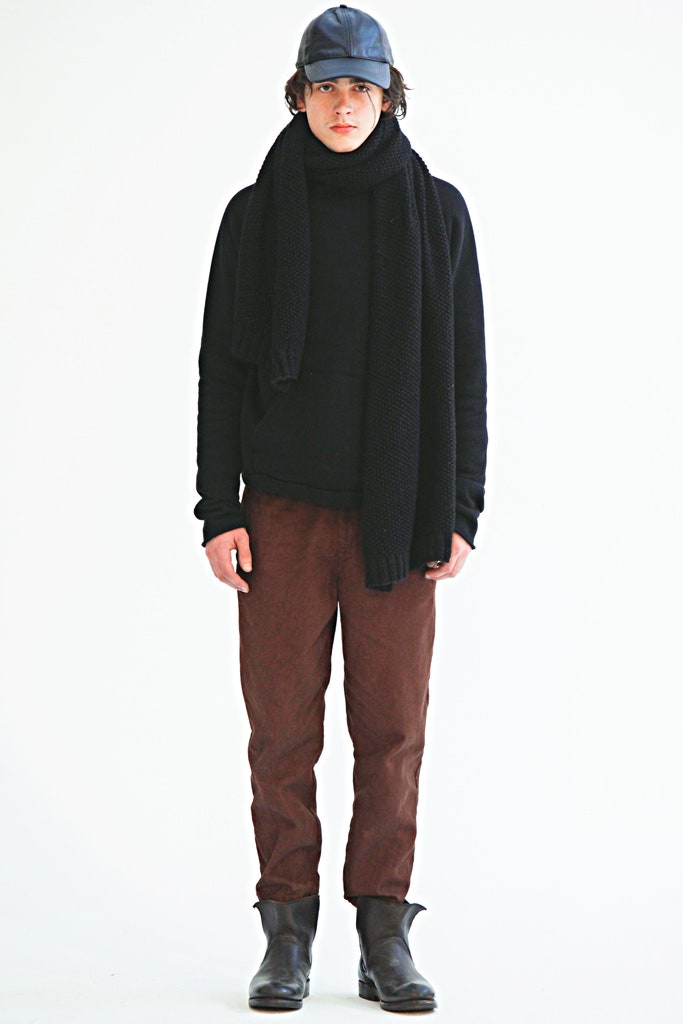 black wool sweater with brown pants