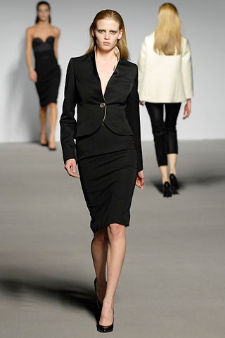 black fitted midi dress and white blazer