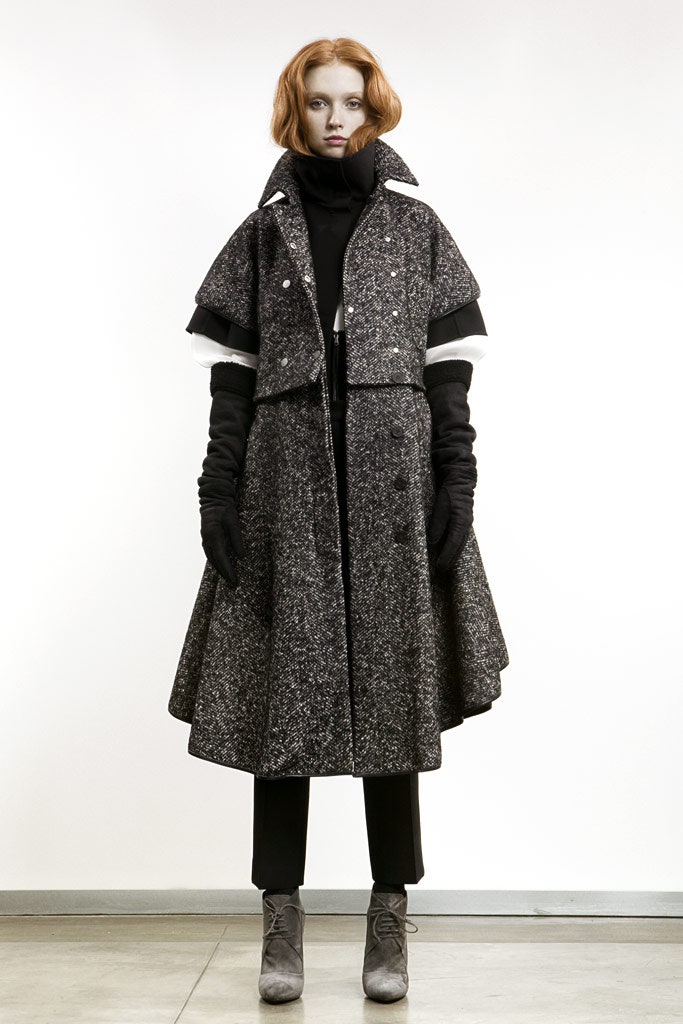 black wool long-sleeve collared relaxed pleated buttoned coat