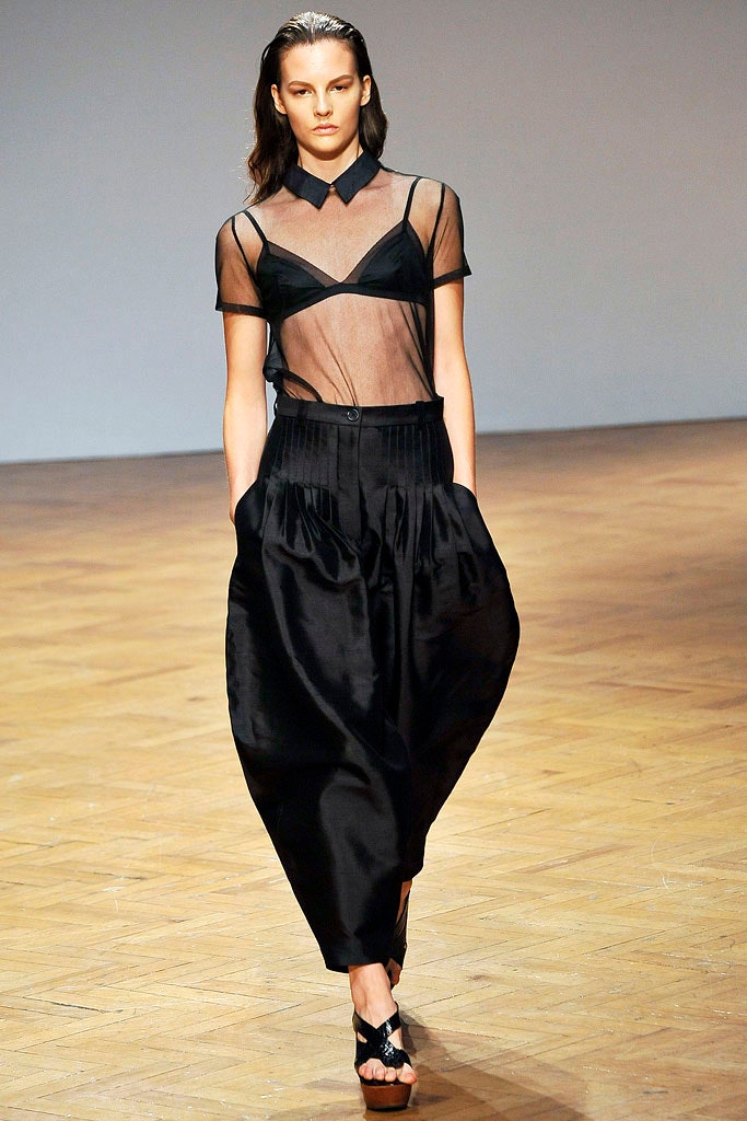 black mesh top and pleated skirt