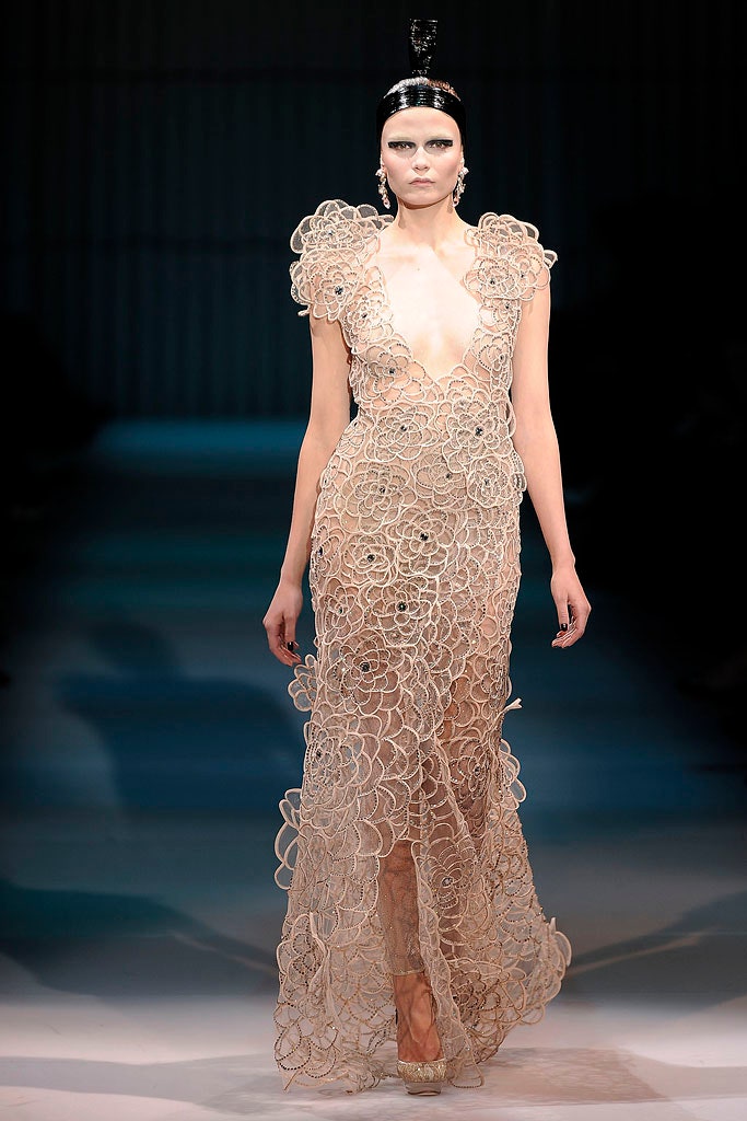 beige embroidered sleeveless gown