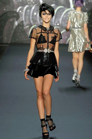 black silk top and leather mini skirt