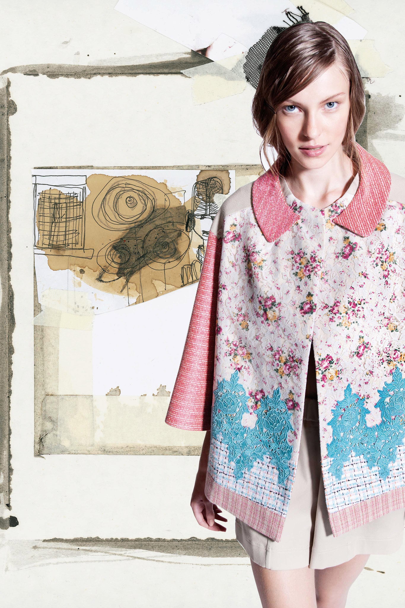 floral cape with beige shorts