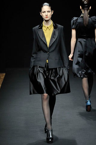 black blazer with pleated skirt
