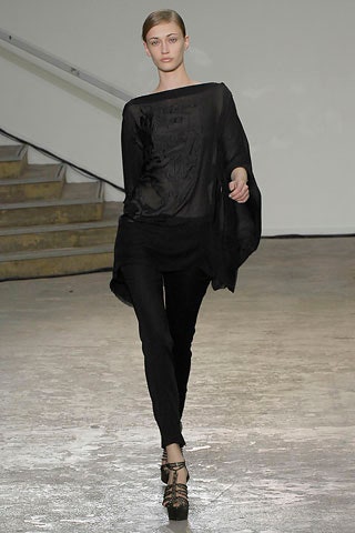 black sheer top with fitted pants