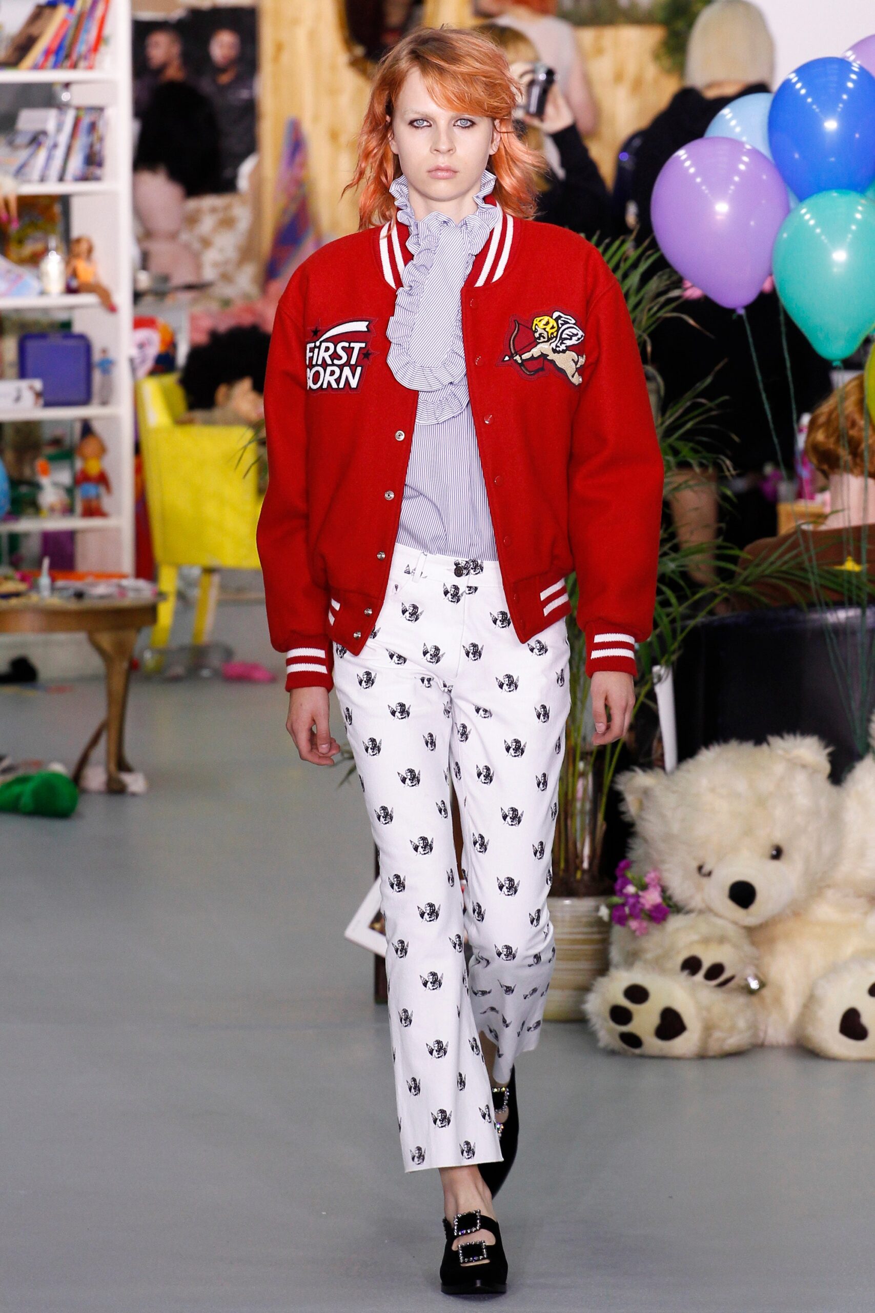 red jacket blue blouse white pants