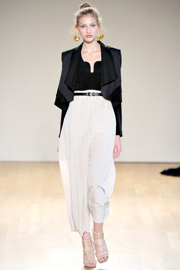 black silk jacket with white pants
