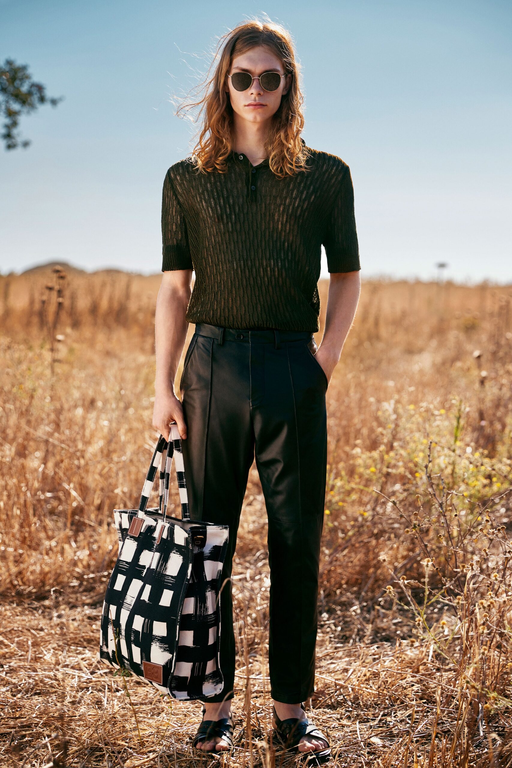 black fitted top with tailored pants