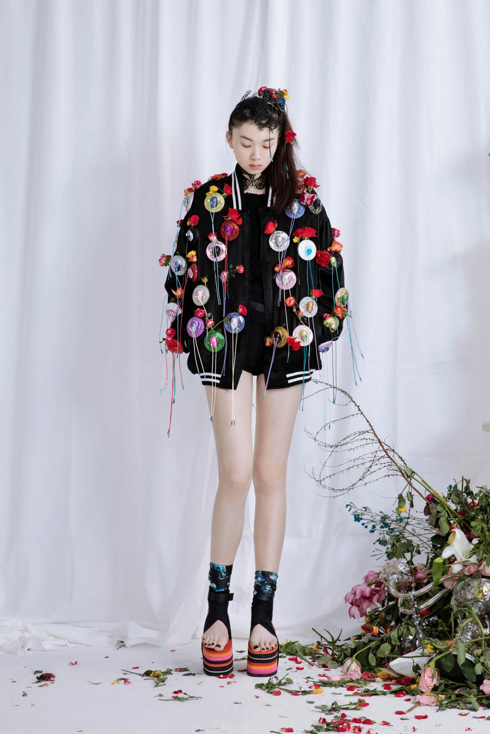 black fitted jacket with embroidered details