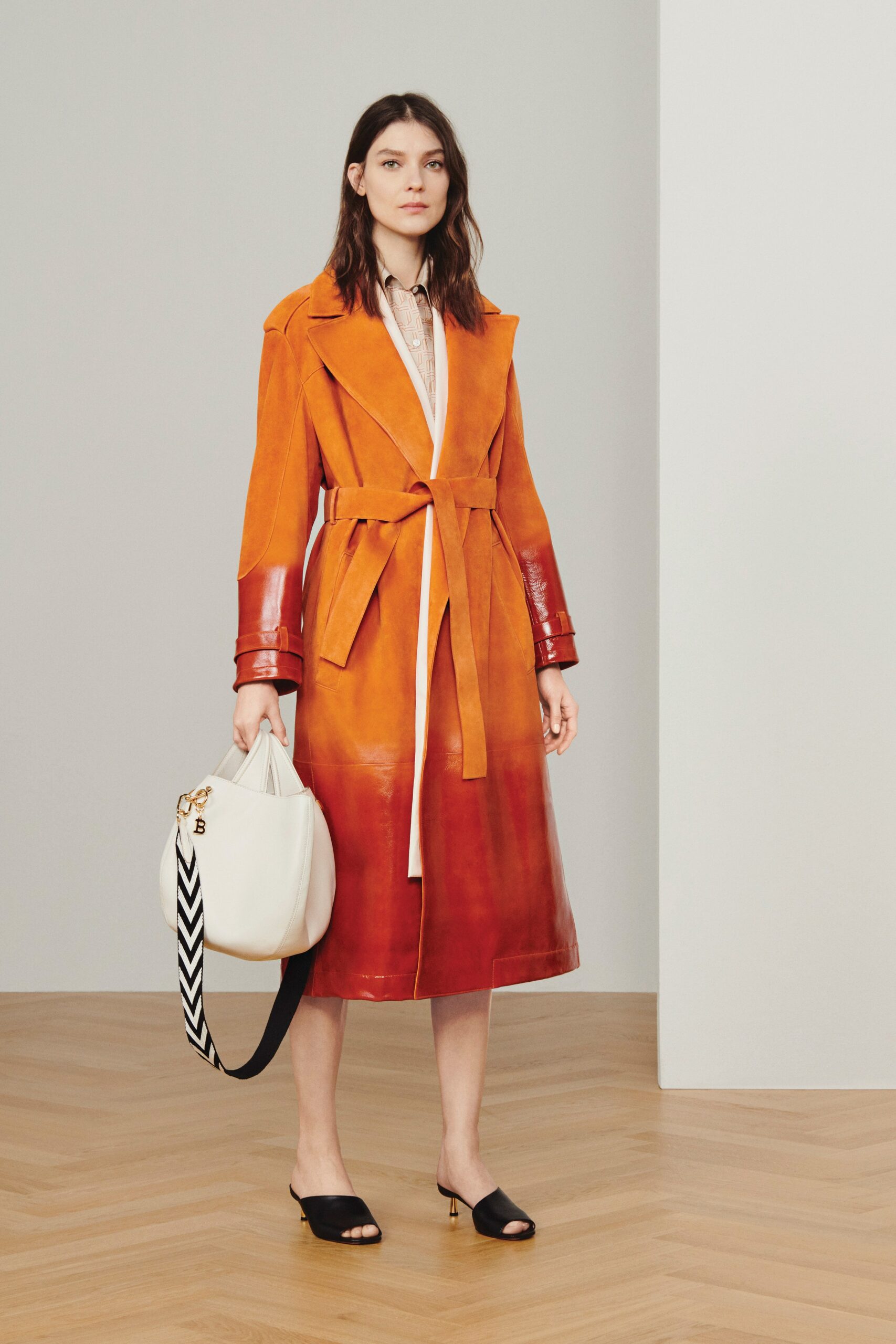 orange red leather trench coat