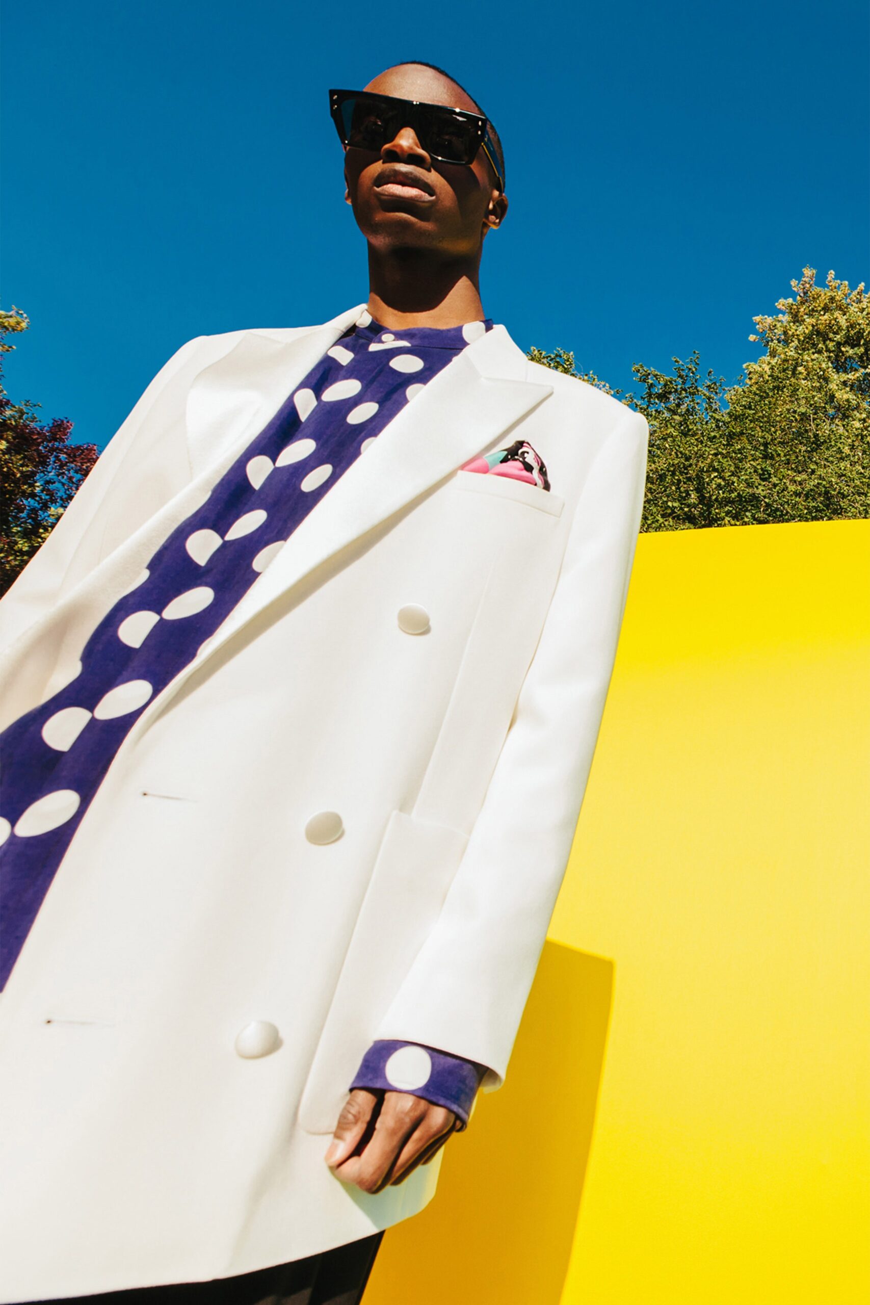 white tailored blazer with polka-dot top
