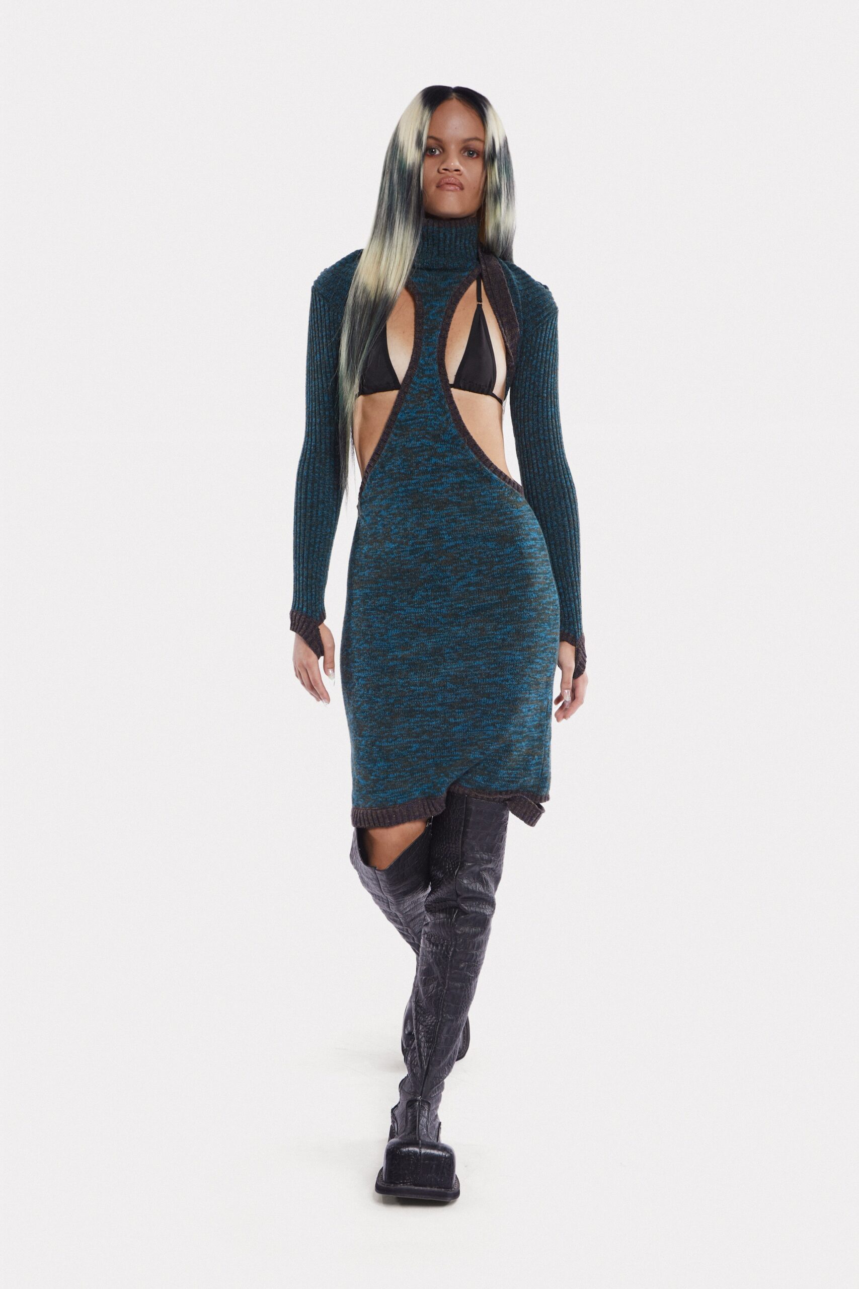 blue knit cutout dress with black boots