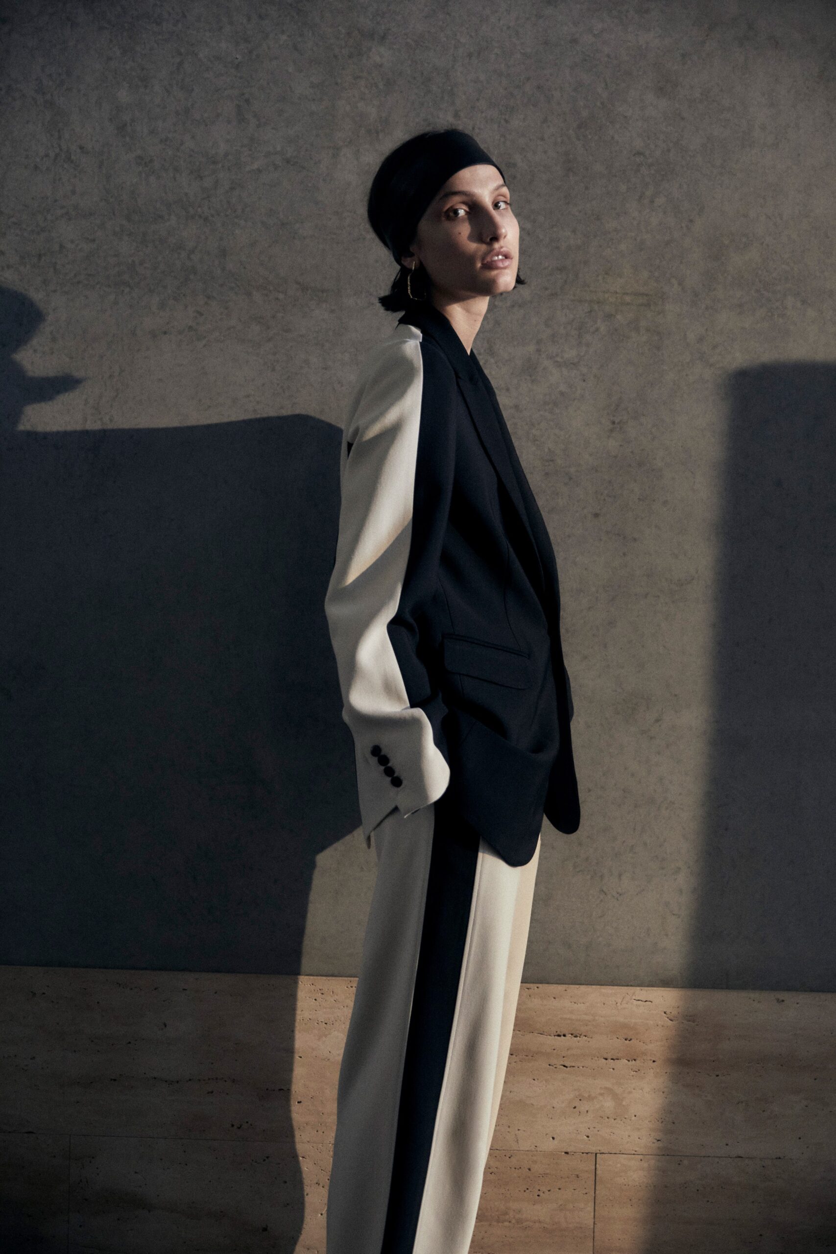 black and beige tailored suit