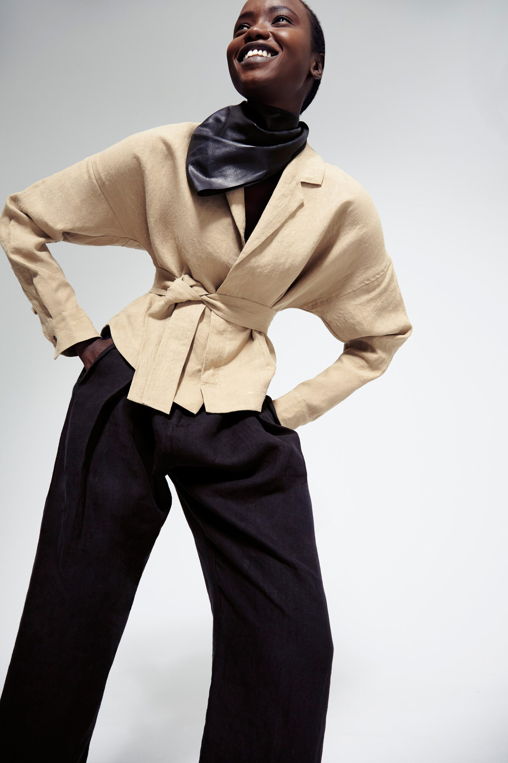 beige relaxed blazer with black pants