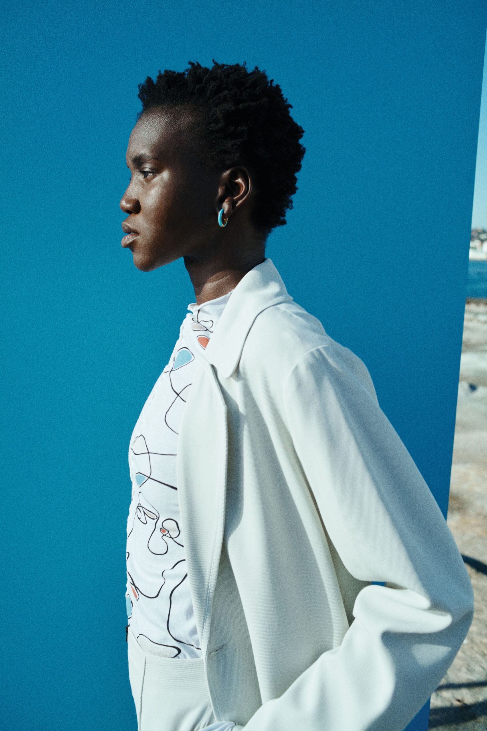 white fitted jacket and top