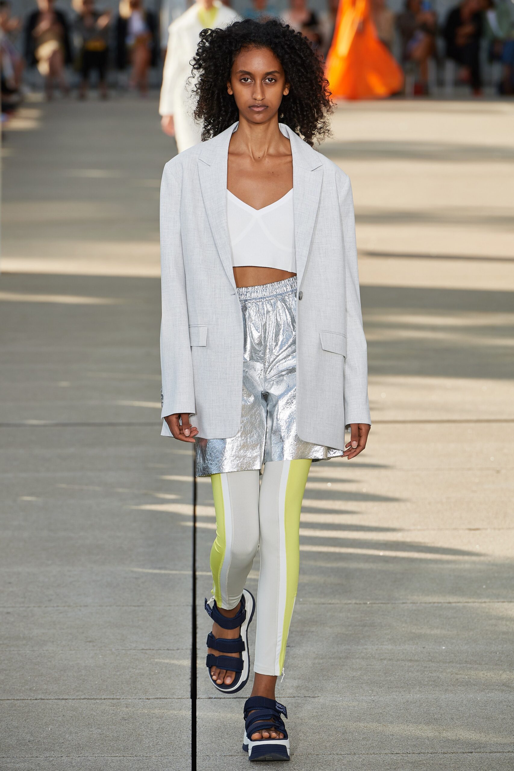 gray oversized blazer with silver shorts