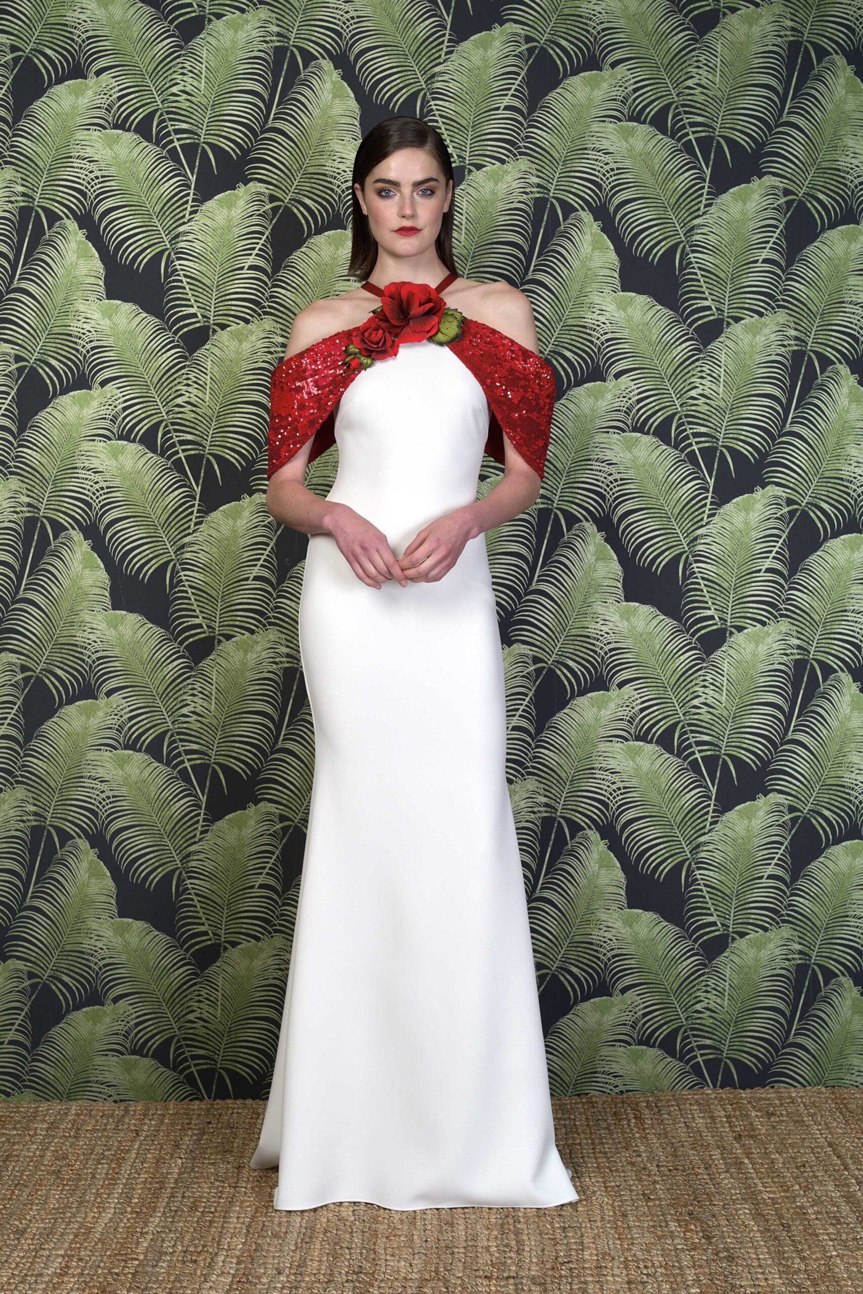 white silk fitted gown with red scarf