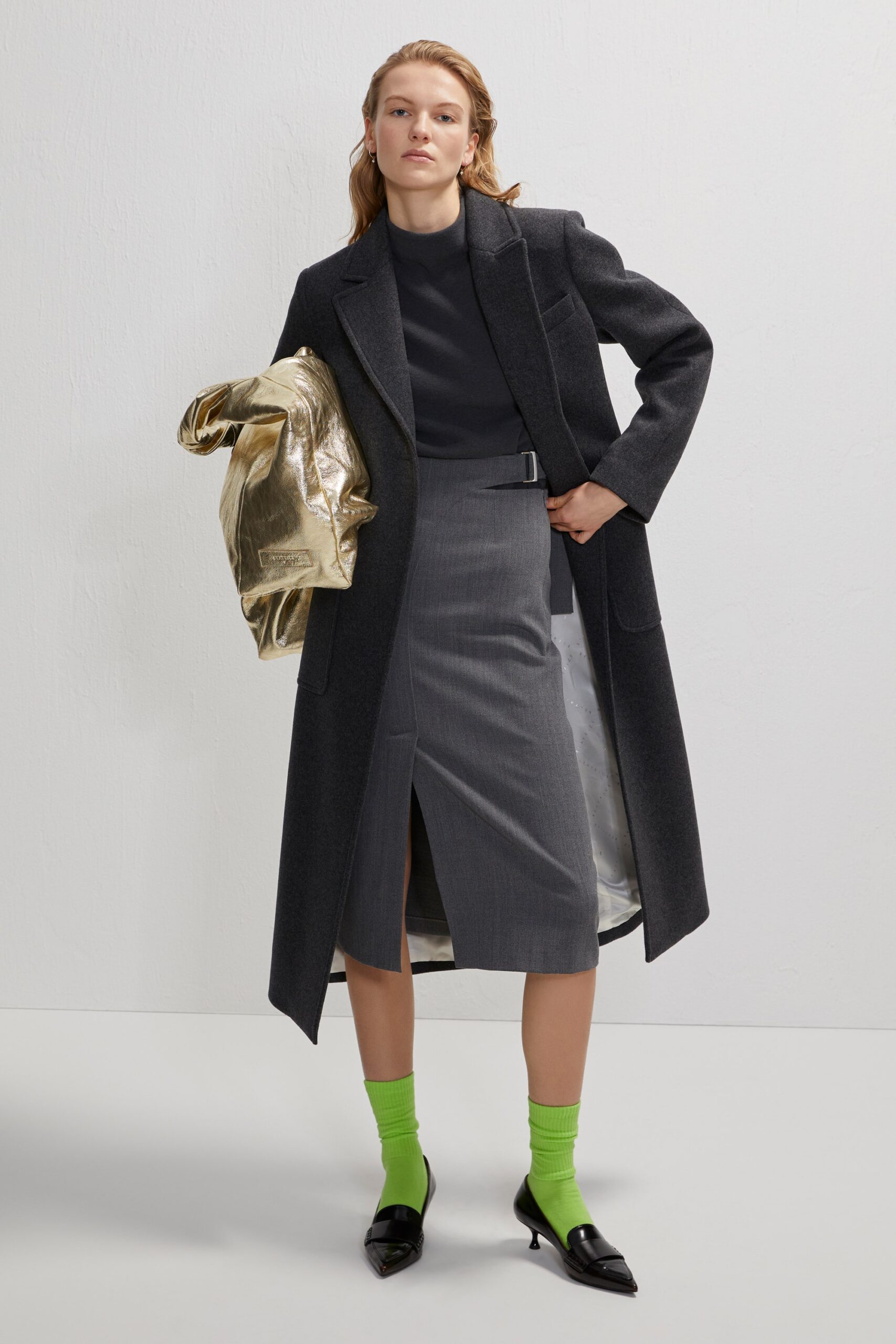 gray tailored coat with black top