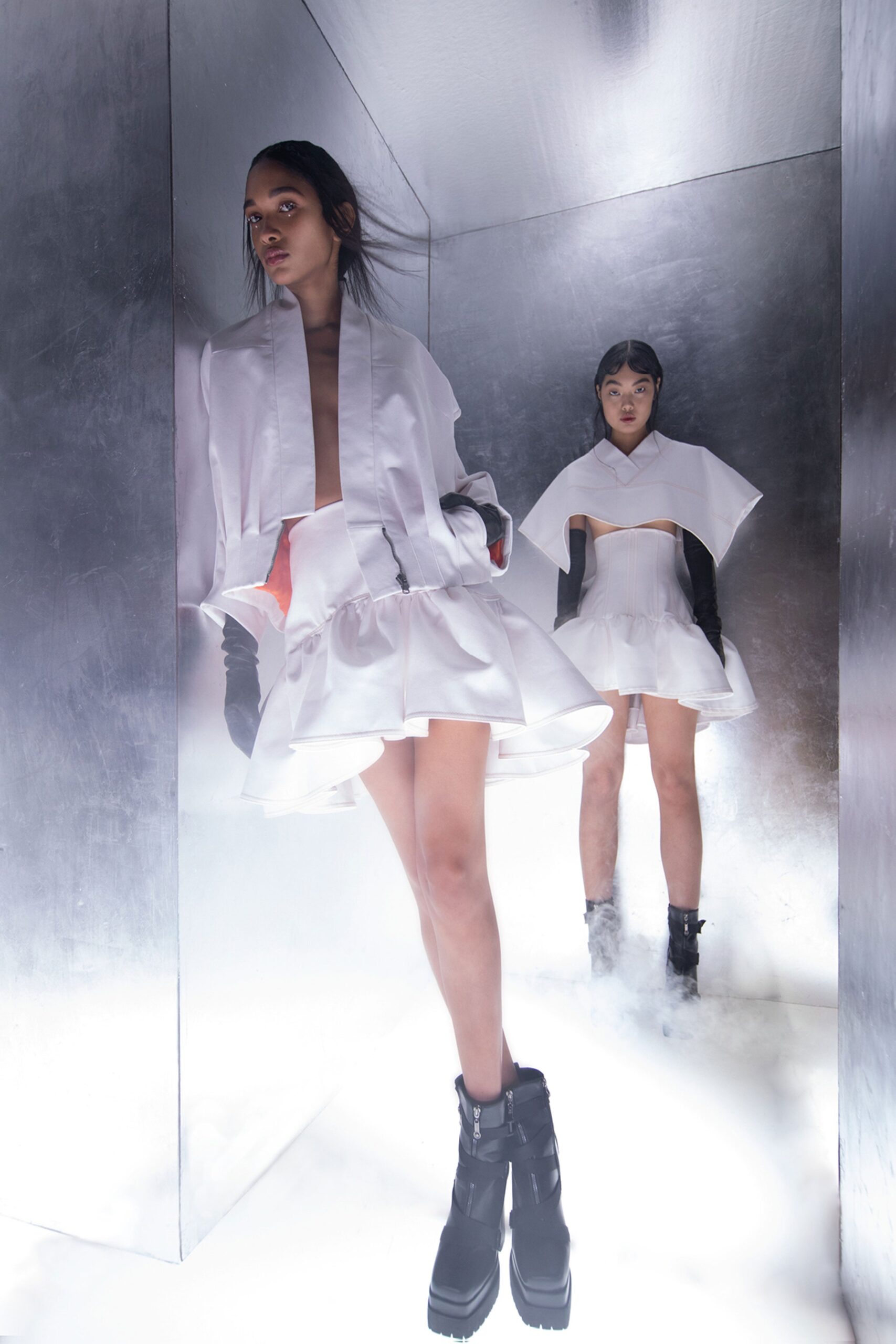 white pleated mini dresses with black boots