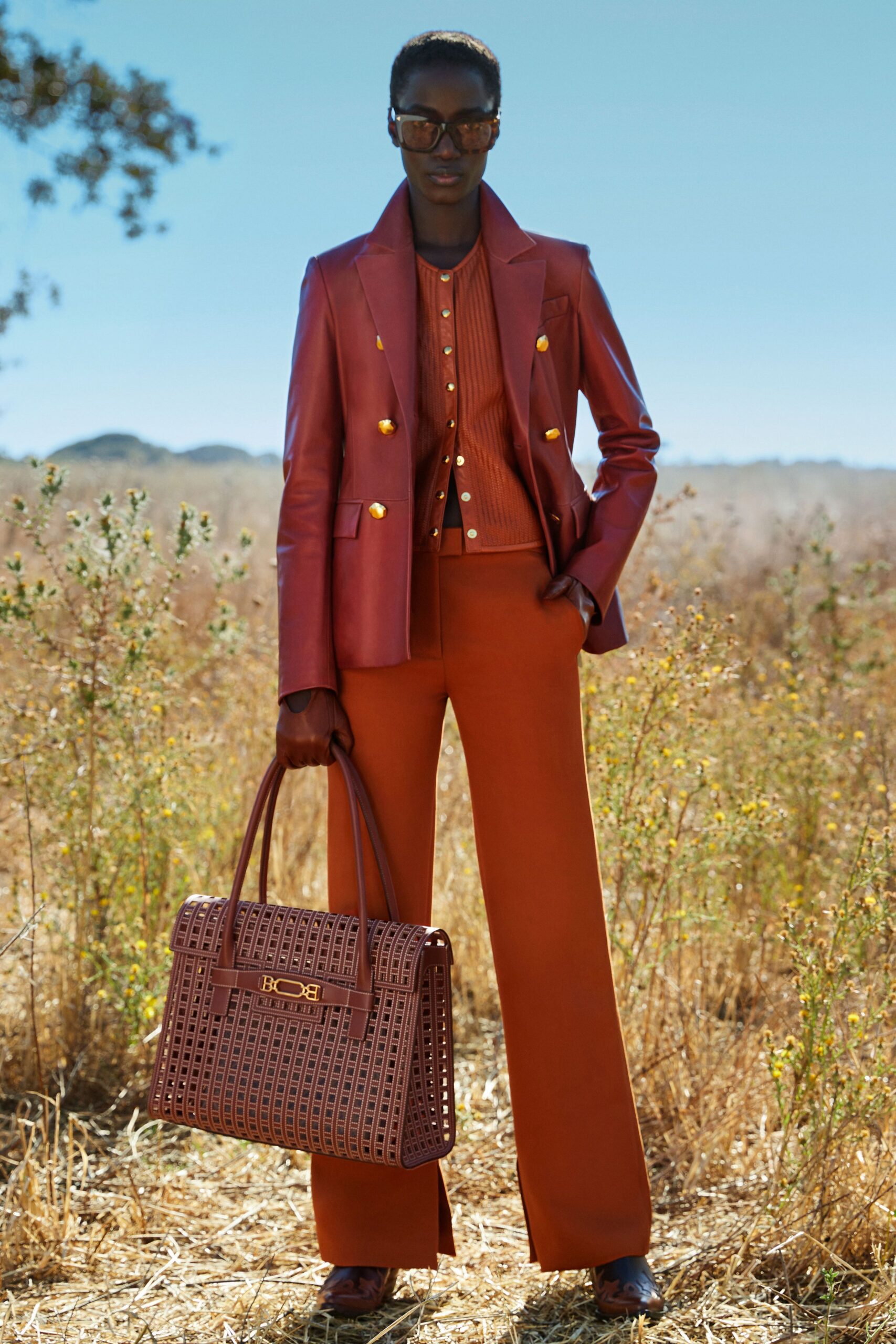 red leather long-sleeve collared tailored buttoned blazer
