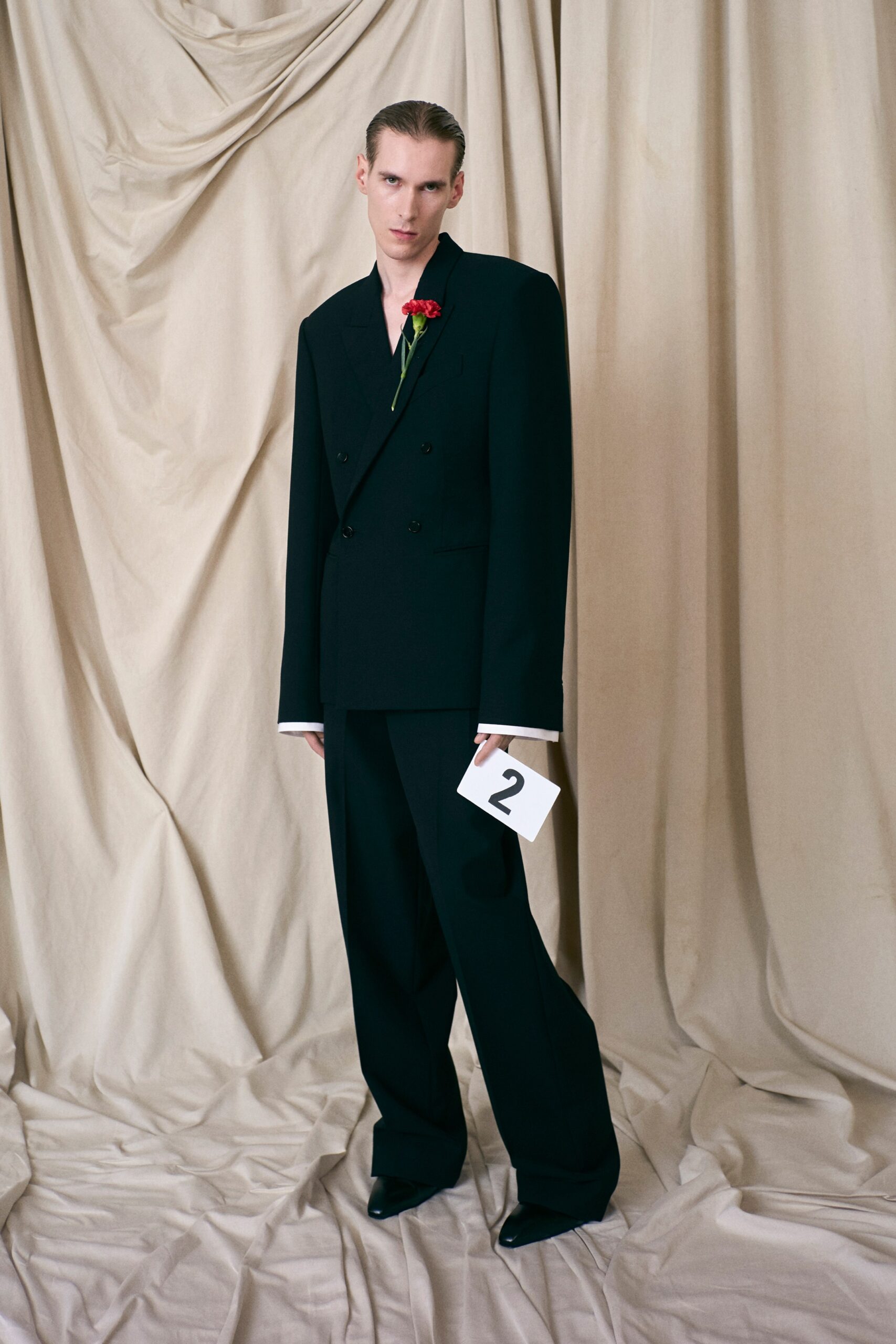 black long-sleeve collared oversized suit