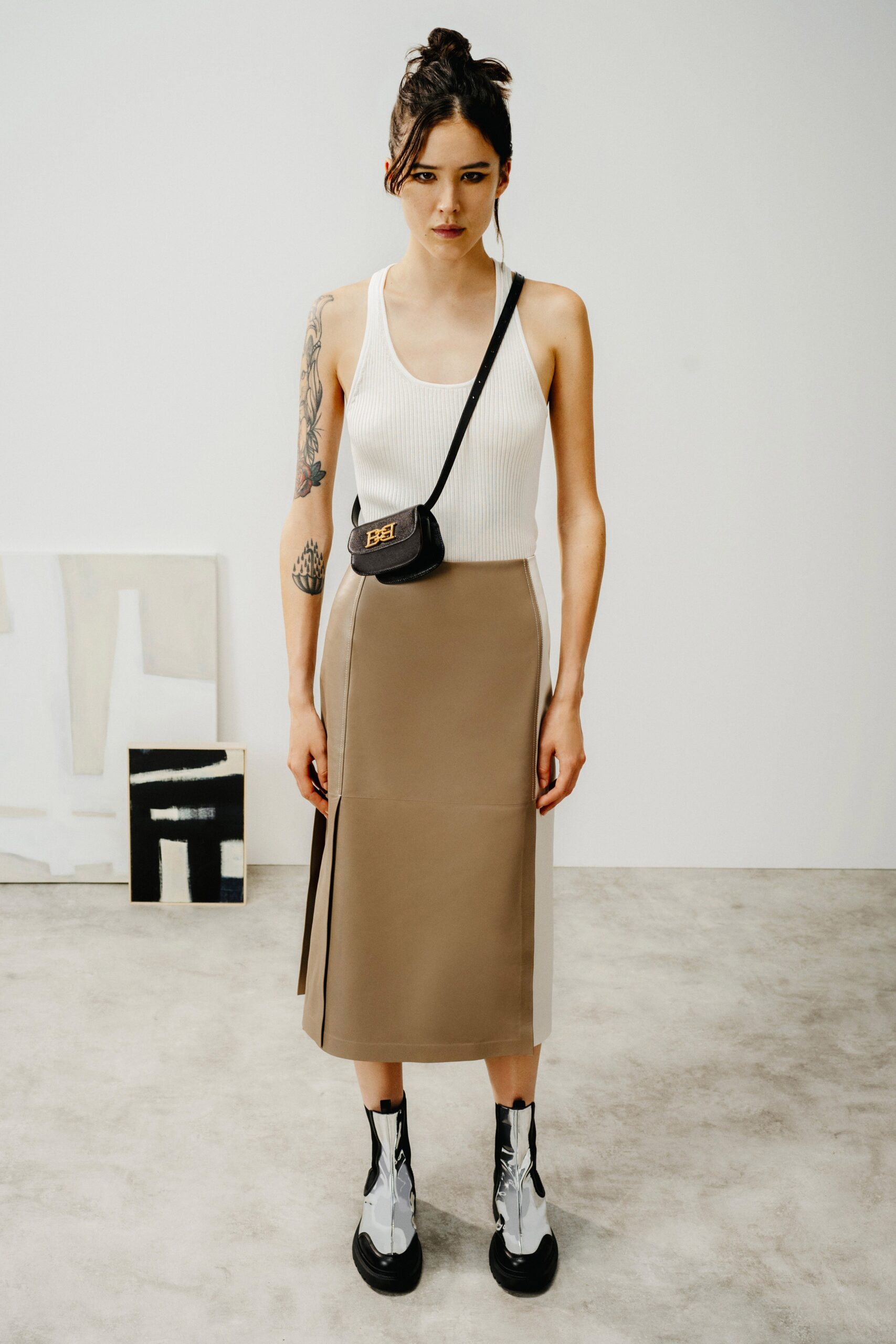 white fitted top with beige midi skirt