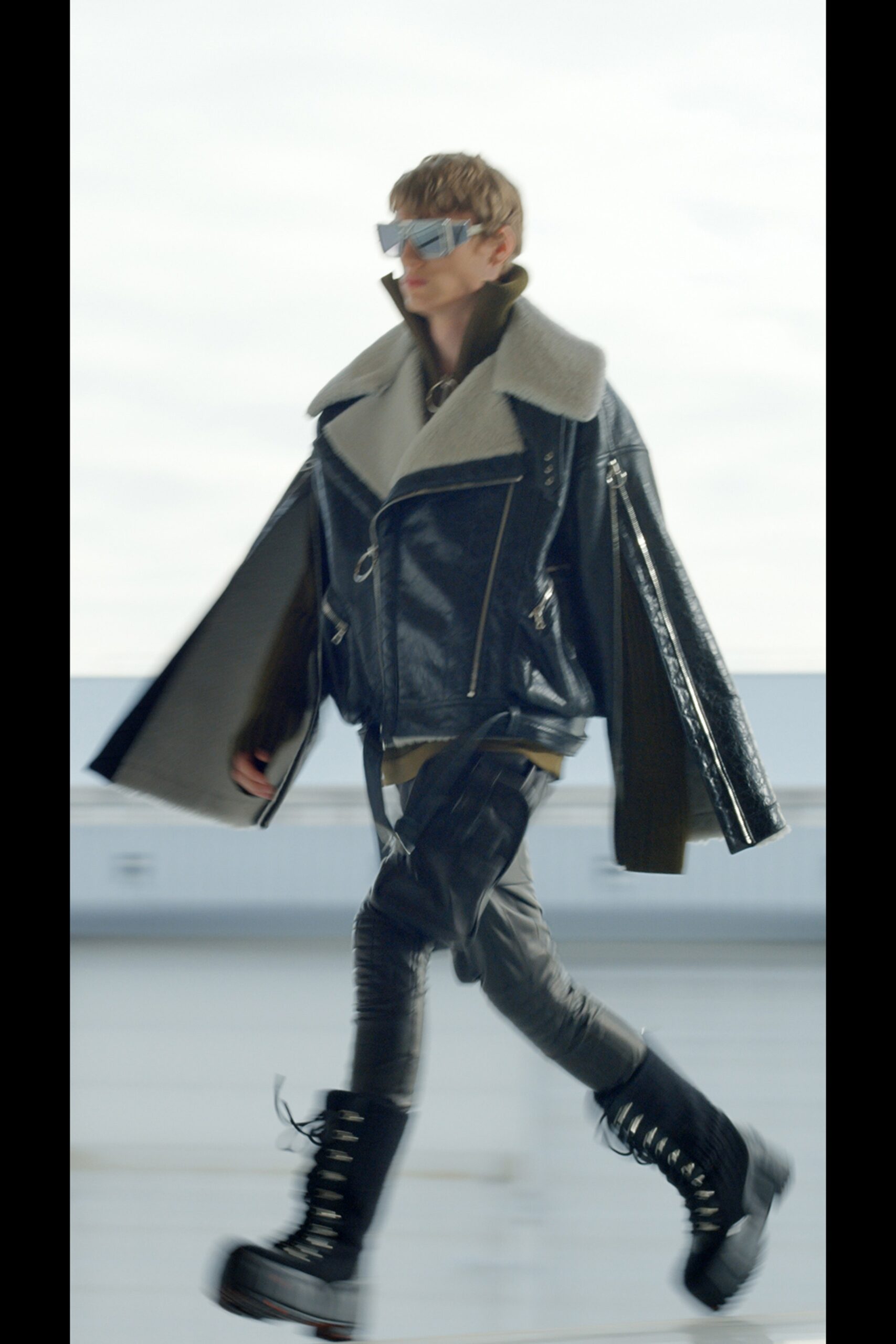 black leather long-sleeve collared oversized zippered pockets jacket