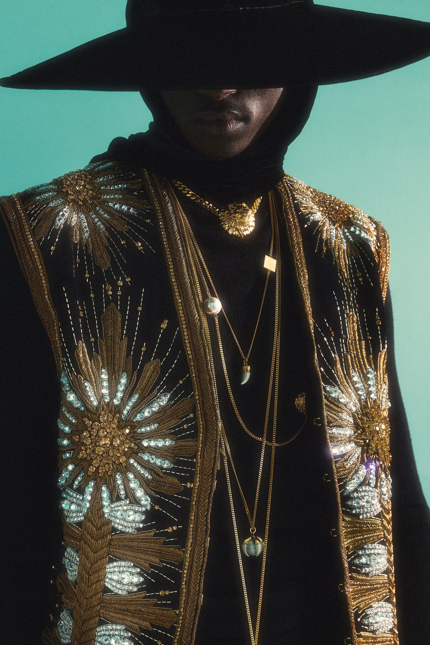 black embroidered vest with hat