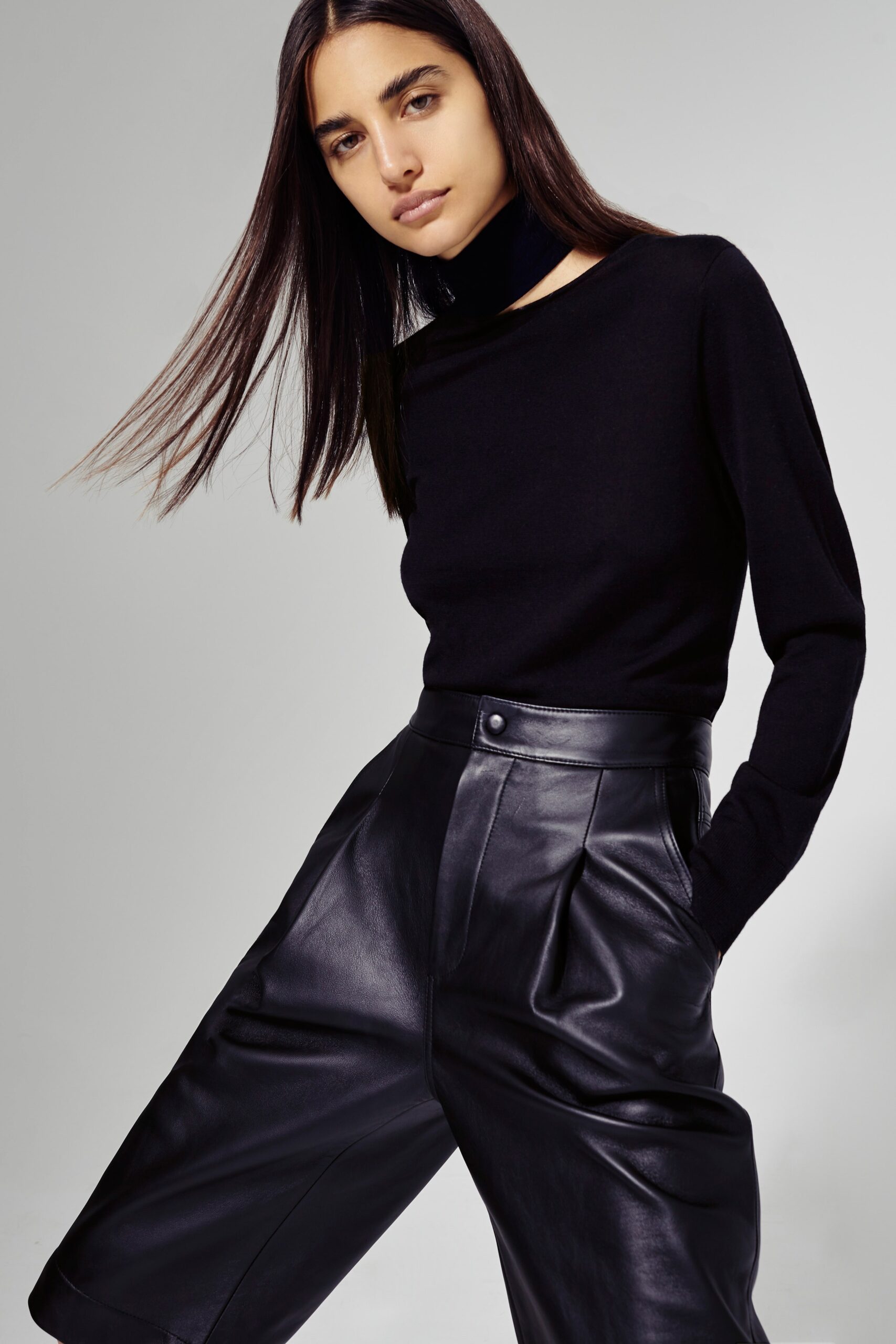 black wool top and leather pants