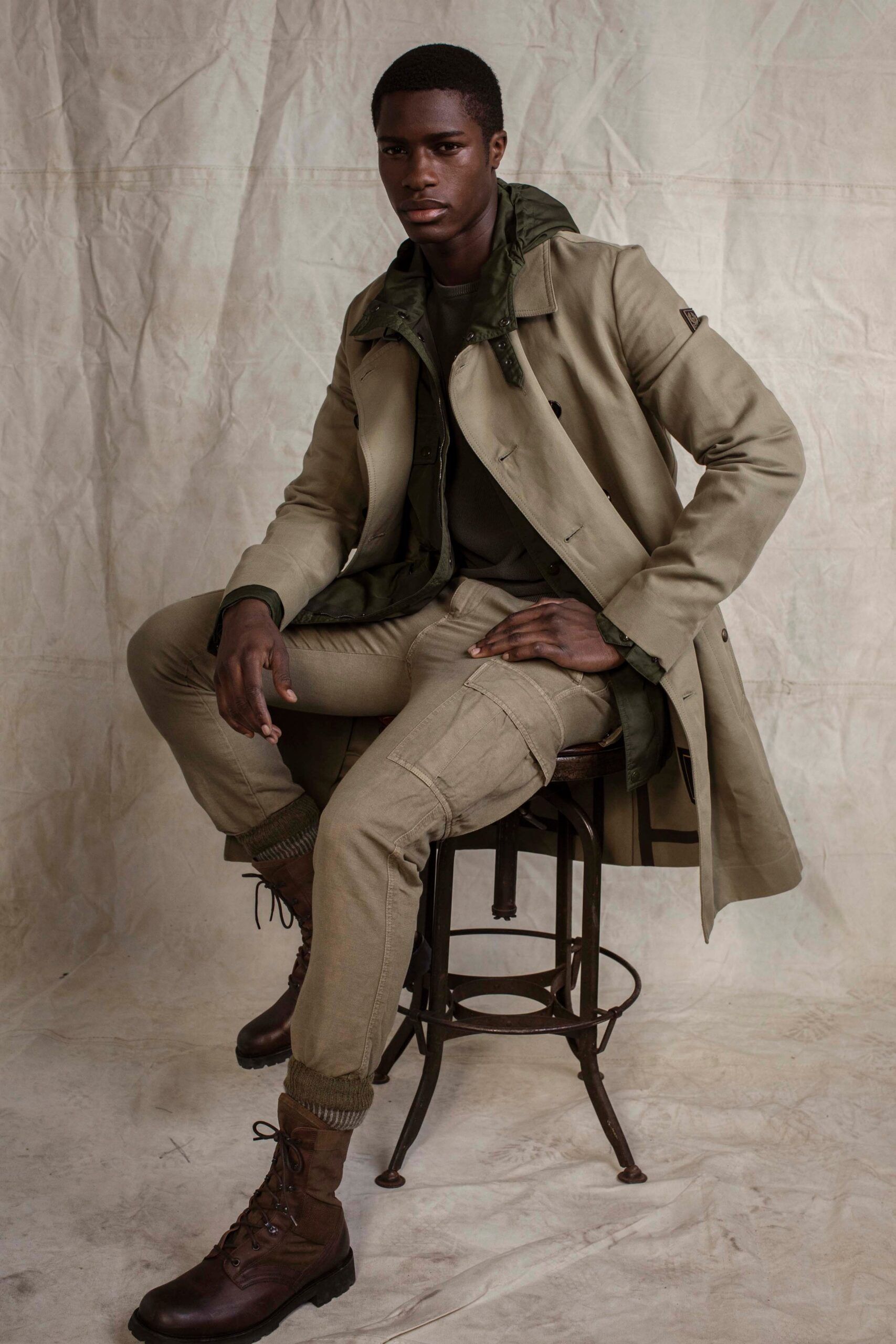 beige trench coat layered look