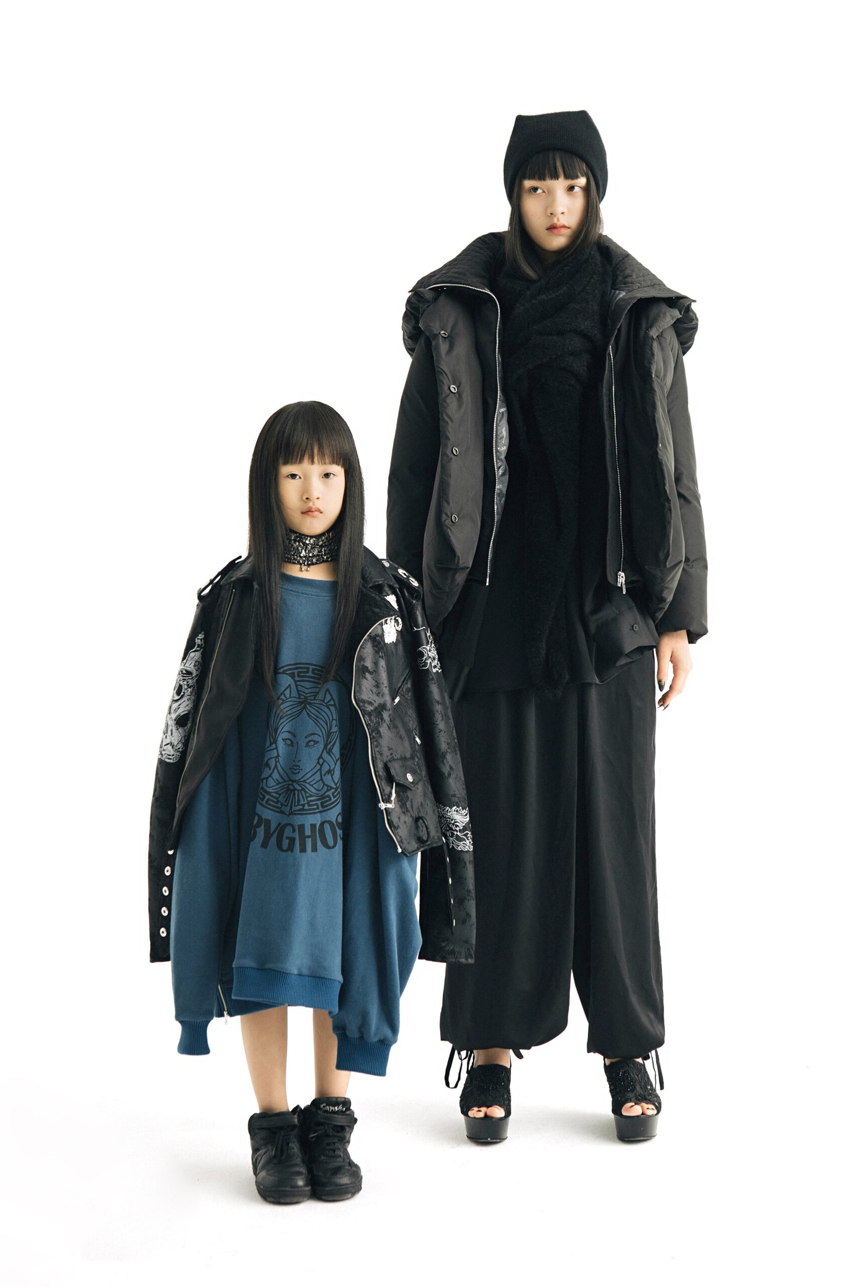 black coat blue oversized sweater